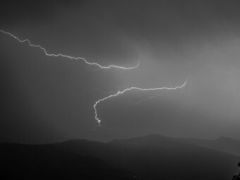 low-angle-view-lightning-against-sky-night